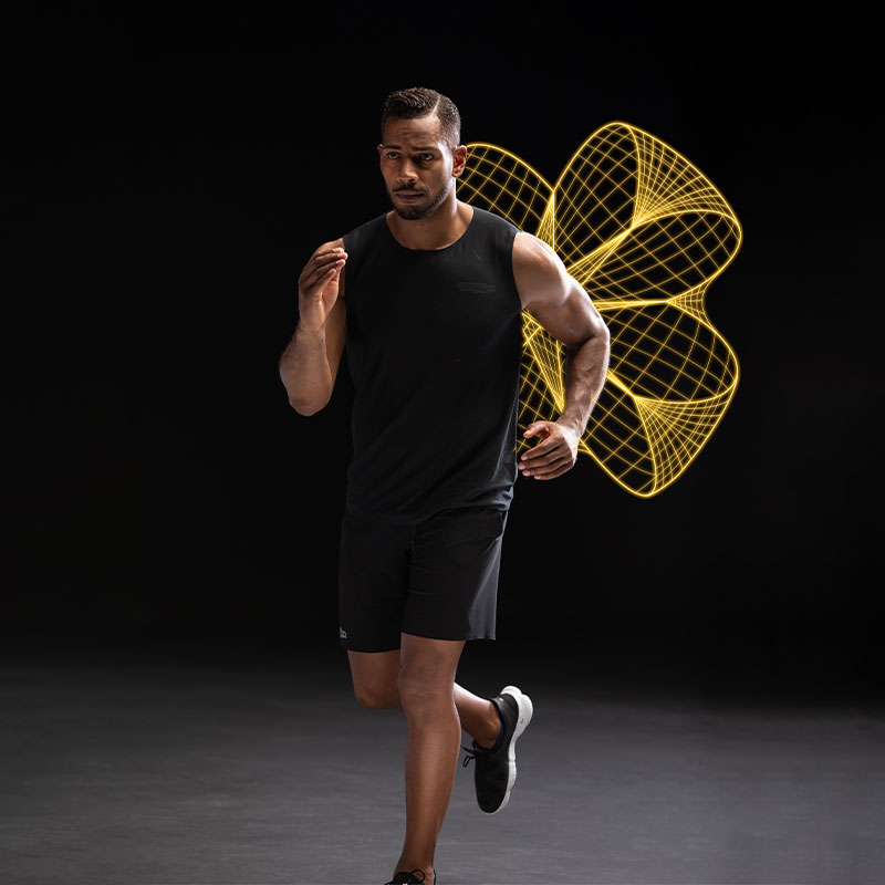Man running simulating the resistance of Technogym treadmills