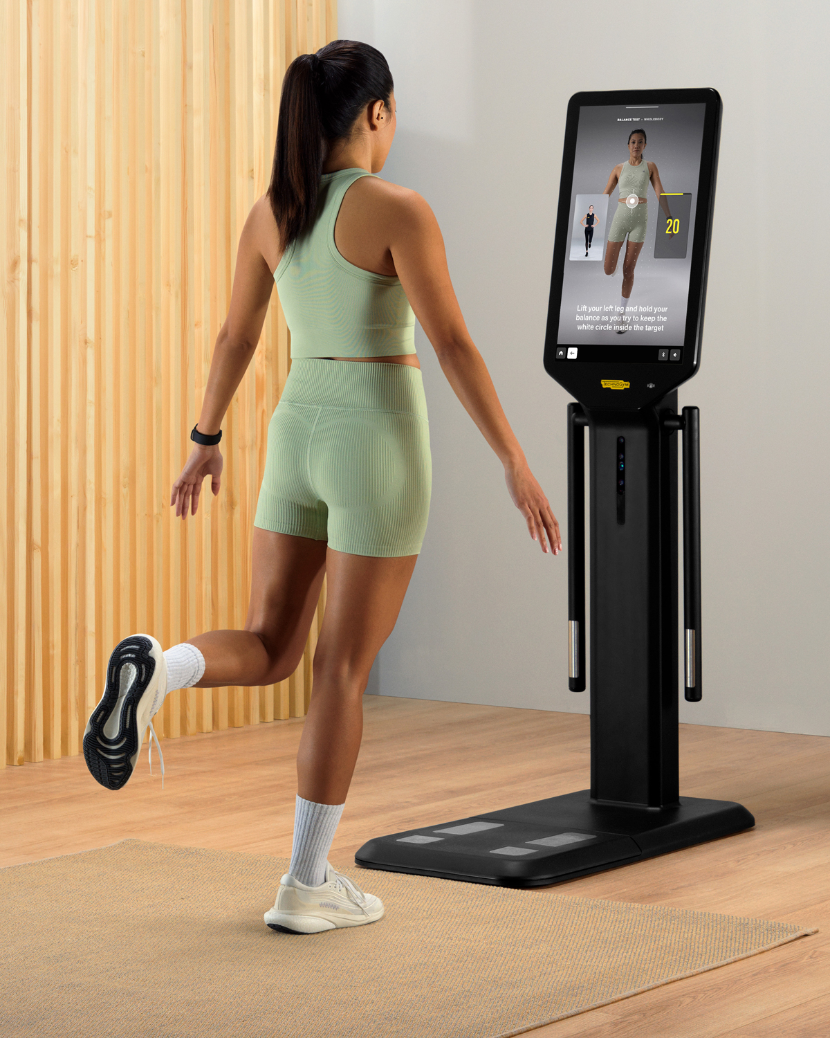 Person doing the Technogym Checkup balance test