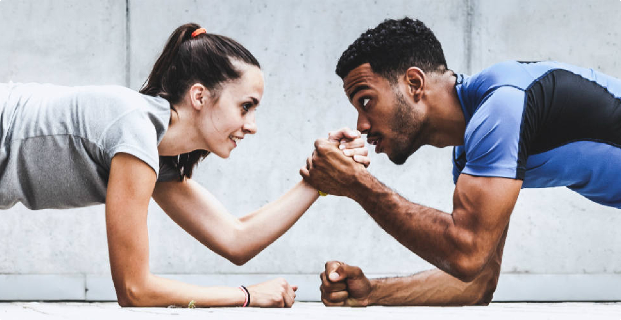 man-woman-arm-wrestling